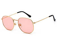 Круглые очки в золотистой оправе с розовой линзой