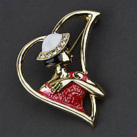 Брошка металева на золотистій основі дівчина в капелюсі із сапфірами покрита кольоровою емаллю розмір 45Х40 мм
