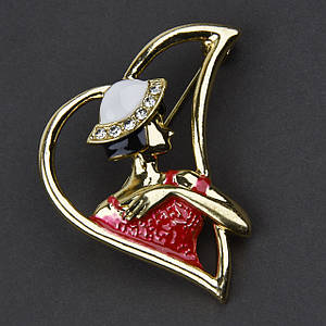 Брошка металева на золотистій основі дівчина в капелюсі із сапфірами покрита кольоровою емаллю розмір 45Х40 мм