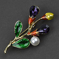 Брошка металева на золотистій основі гілочка з фіолетовими стразами покрита кольоровою емаль розмір 50Х30 мм