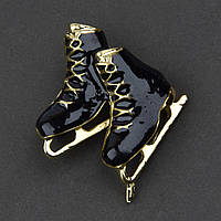 Брошка металева на золотистій основі чорні ковзани покрита кольоровою емаллю розмір 30Х25 мм