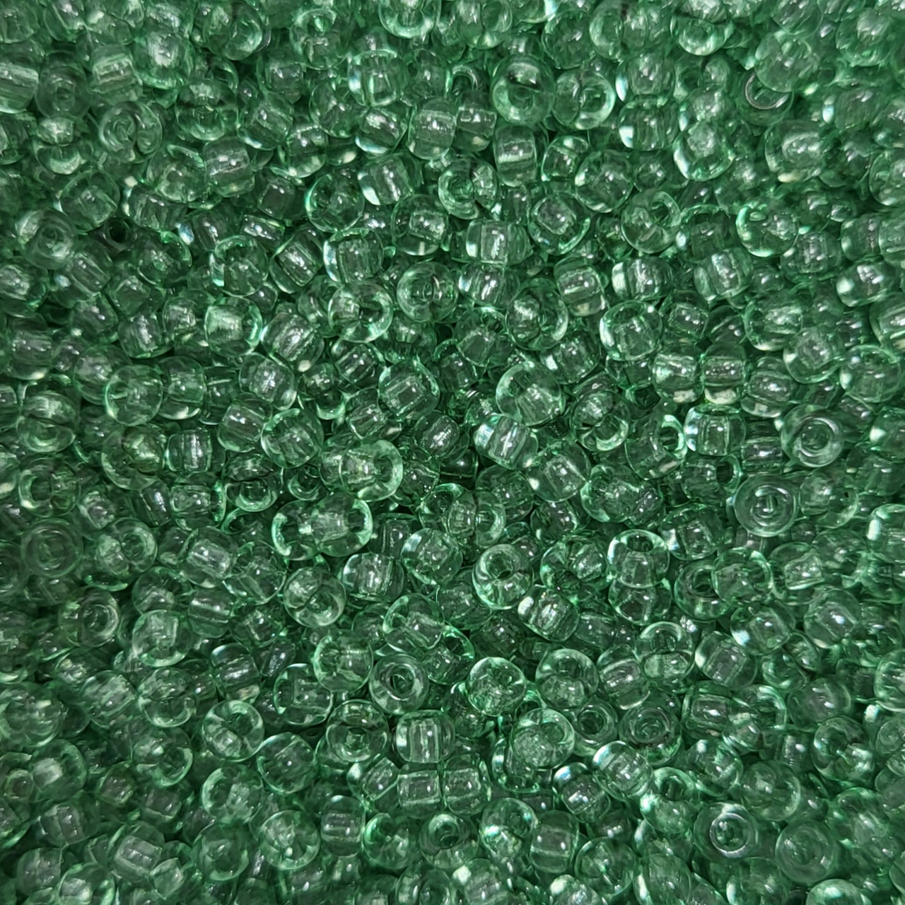 01162 чеський бісер Preciosa 10 грам прозорий зелений світлий