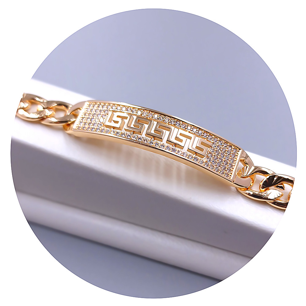 Браслет ХР M&L із рифленням. Позолота 18К. Камені: білий циркон. Довжина: 20 см. Ширина: 10 мм.