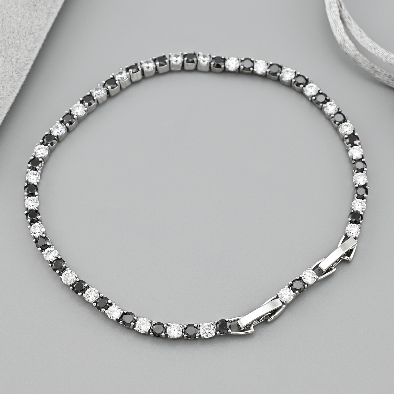 Браслет Алмазний танець 38930 ширина 3 мм чорні та білі фіаніти позолота Біле Золото довжина 19+2, фото 1