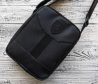 Черная компактная сумка мессенджер Puma Ferrari стильная и вместительная модель.