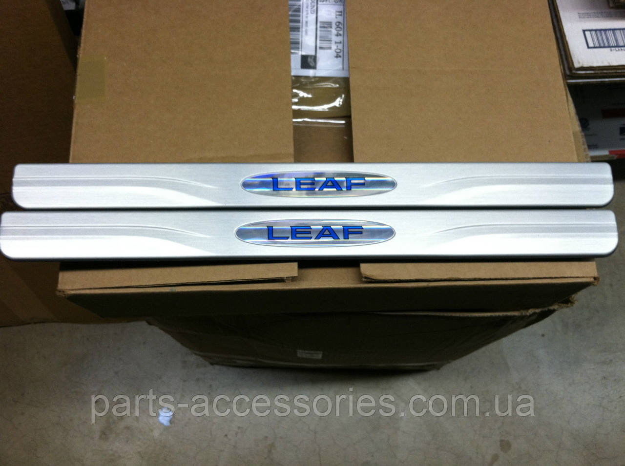 Nissan Leaf 2011-2017 Накладки на дверні пороги передні Нові Оригінал, фото 1