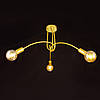 Люстра лофт на 3 патрони на зігнутих металевих тримачах золотистого кольору Brille BR-01 604S/3 E27 G, фото 4