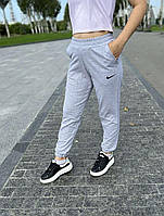 Спортивні штани жіночі з манжетом трикотажні світло-сірі (розмір 44-52)