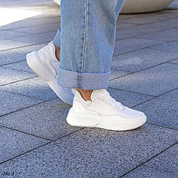 Жіночі білі шкіряні кросівки
