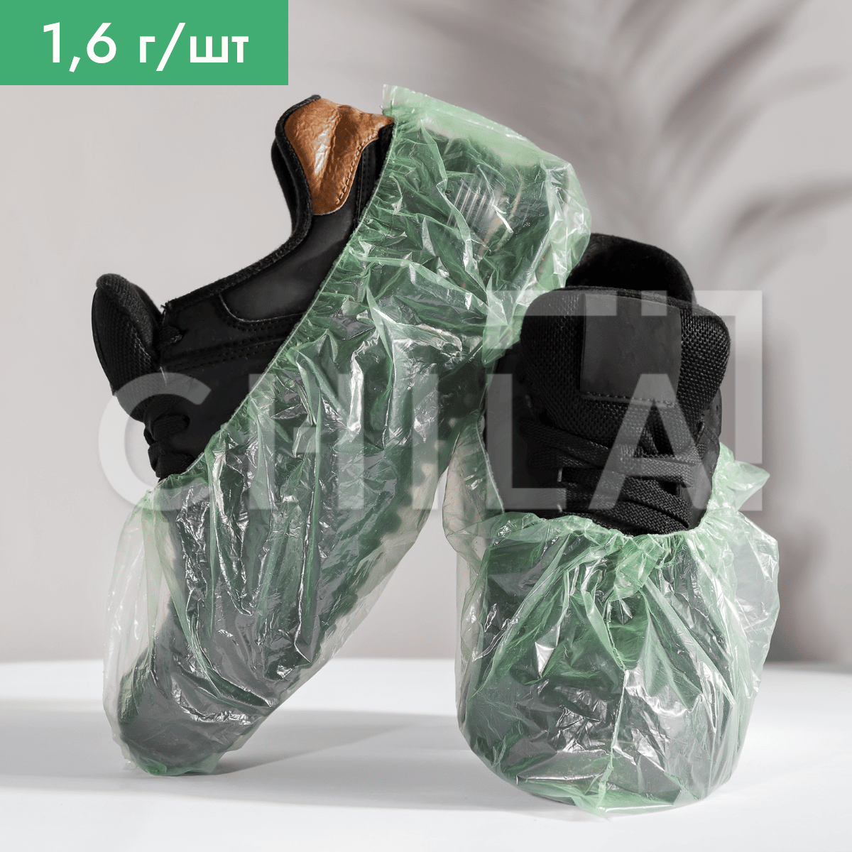 Бахіли одноразові 1,6 г/шт Зелені (100 шт = 50 пар/упак) - фото 1 - id-p1842906268