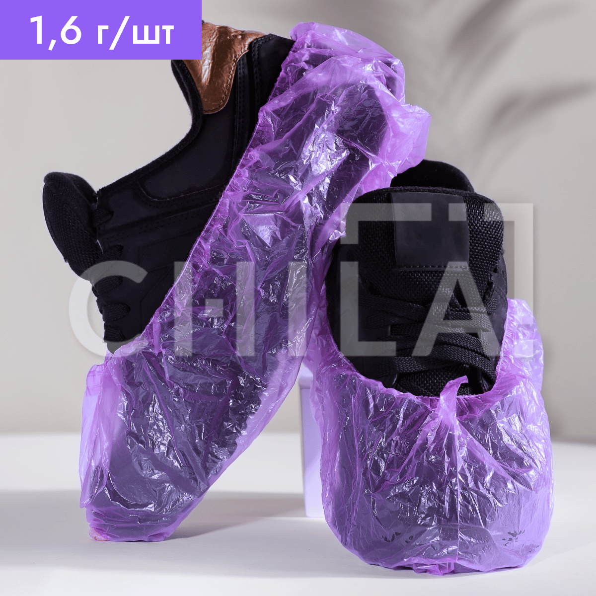 Бахіли одноразові 1,6 г/шт Фіолетові (100 шт = 50 пар/упак) - фото 1 - id-p1842906267