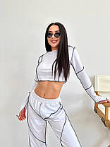 Трендовий жіночий костюм шви навиворіт укорочена кофта та штани на резинці Dv5427, фото 2