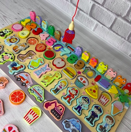 Дитяча дерев'яна іграшка Розвиваючий центр з риболовлею і вкладишами 2в1 MD 2903