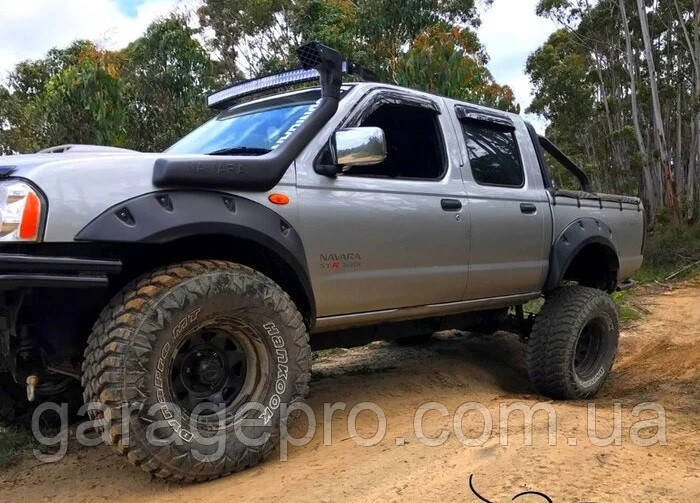 Пластикові фендери — розширювачі арок для Nissan NP300 / Navara D22 (1997 - 2015)