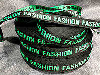Тесьма плетеная 2.5 см (Fashion) 50 м фон черный зеленая надпись