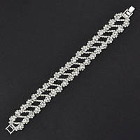 Браслет жіночий м'який металевий на руку сріблястий із квіточками в кристалах довжина 18 см ширина 20 мм