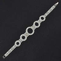 Браслет жіночий м'який металевий на руку сріблястий із візерунками в кристалах довжина 18 см ширина 7 мм