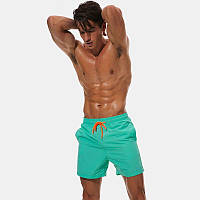 Плавательные шорты от бренда Escatch зеленого цвета