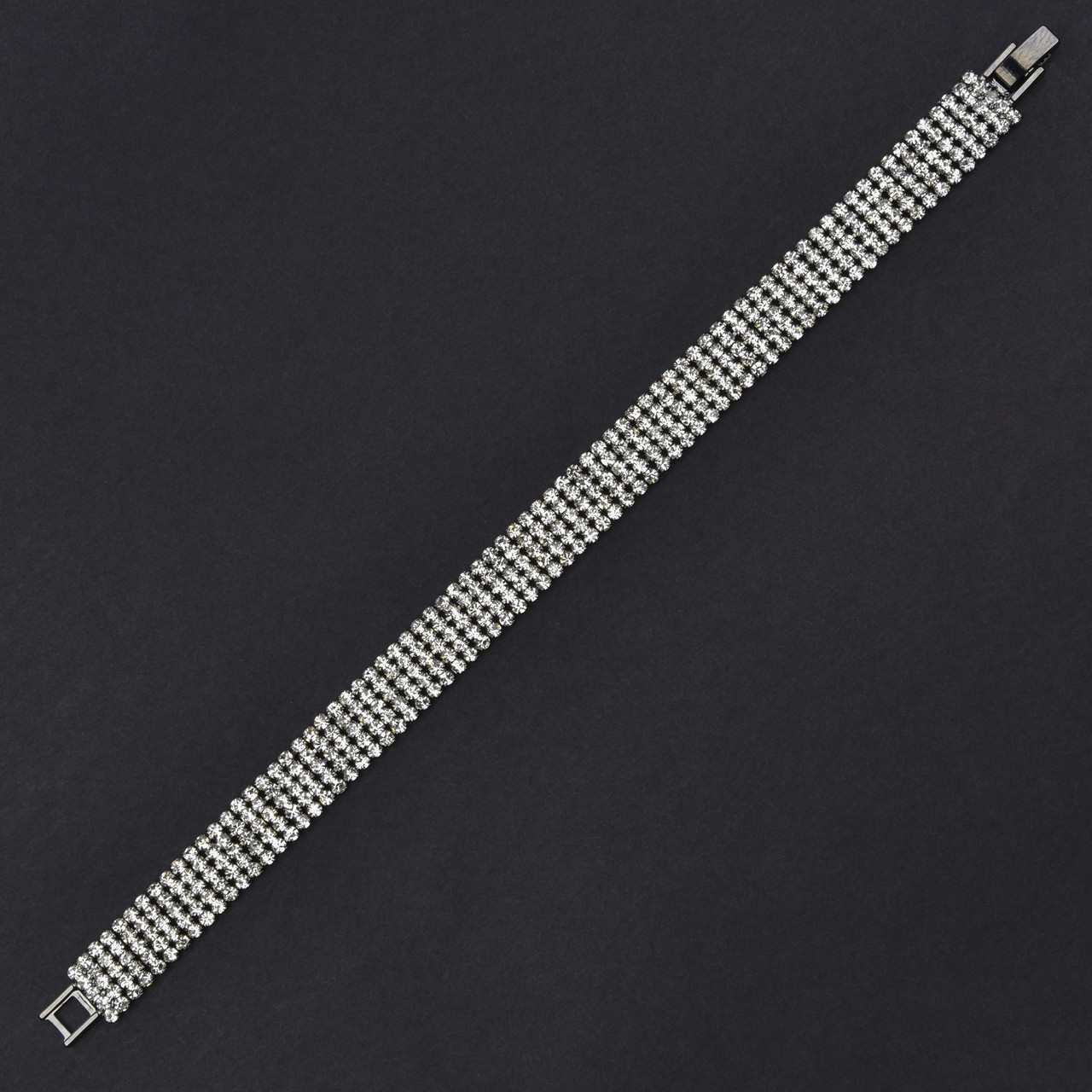 Браслет жіночий м'який металевий на руку сріблястої доріжки кристалів 5 рядів завдовжки 19 см ширина 11 мм - фото 1 - id-p1849061682