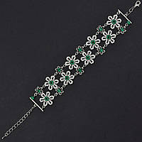 Браслет жіночий м'який металевий на руку сріблястої квіточки з кристалами довжини 23 см ширина 30 мм