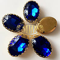 Овал в ажурній золотій оправі Колір Sapphire Розмір 13х18мм