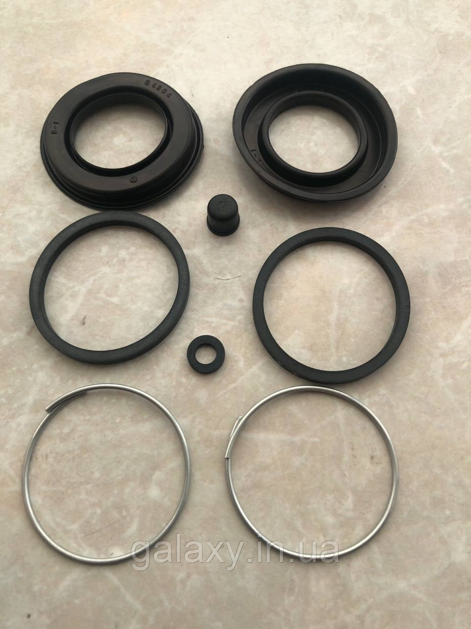 Ремкомплект супорту заднього 38 мм Mercedes W123 / W124 / W202 / W126 / 190 (W201)