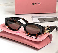 Женские солнцезащитные очки Miu Miu MU11WS LUX