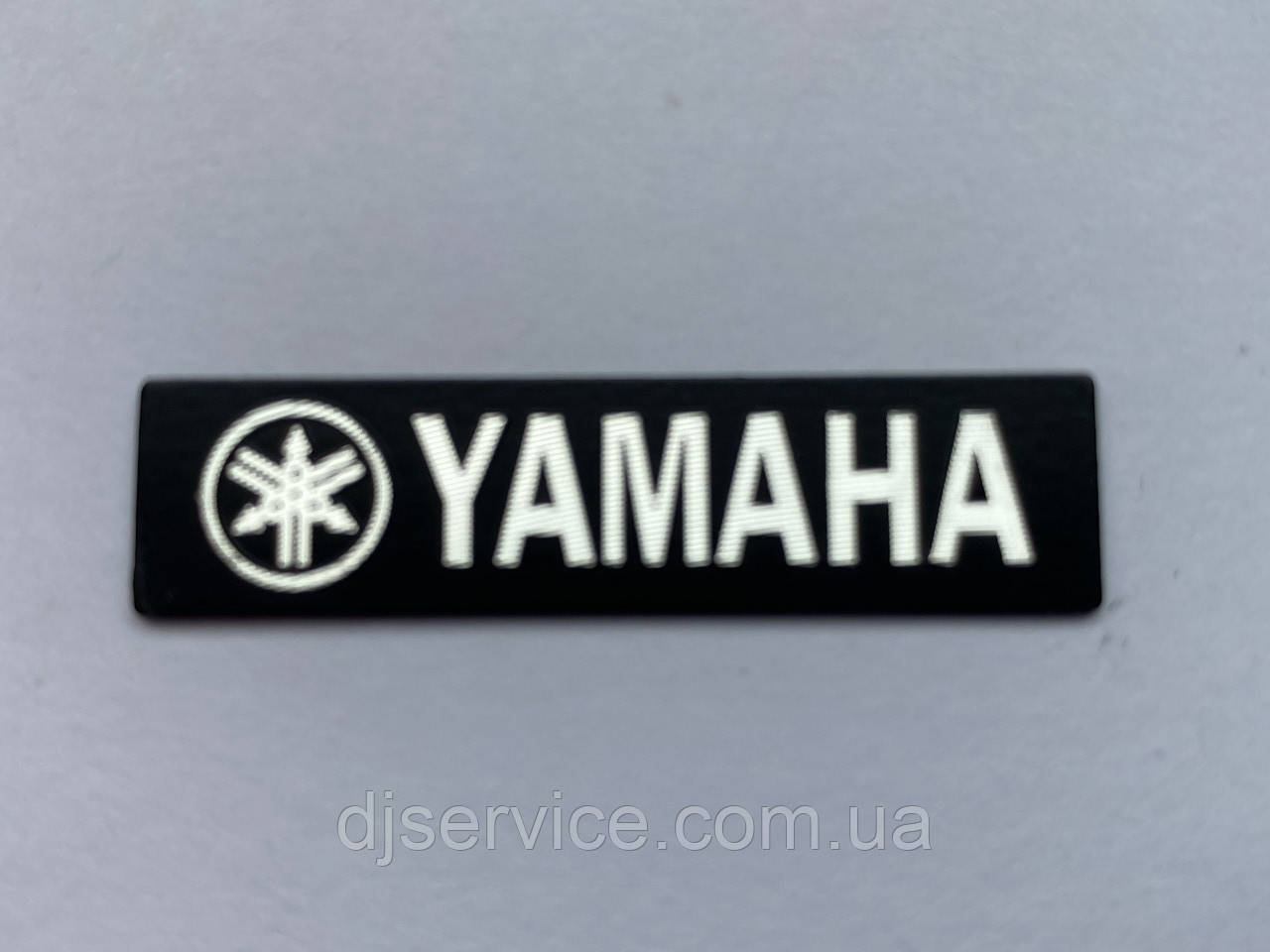Шильдик, наклейка, логотип Yamaha 40x10mm на сітку колонки