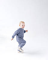 Детский трикотажный спортивный костюм в стиле оверсайз 110 размер в сером цвете Rudi