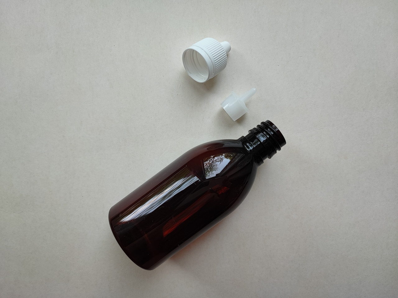 100 - 107 мл з кільцем Круглий ПЕТ флакон коричневий вставка крапельник + кришка з контрольним кільцем 20/410