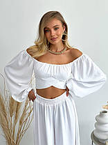 Красивий жіночий костюм Капсула топ з об'ємними рукавами і бантом ззаду та брюки на резинці Df5488, фото 5