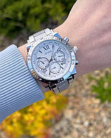 Стильные модные брендовые женские часы на руку на металлическом ремешке