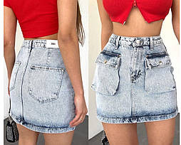 Жіноча коротка блакитна джинсова спідниця з кишенями в 36 розмірі