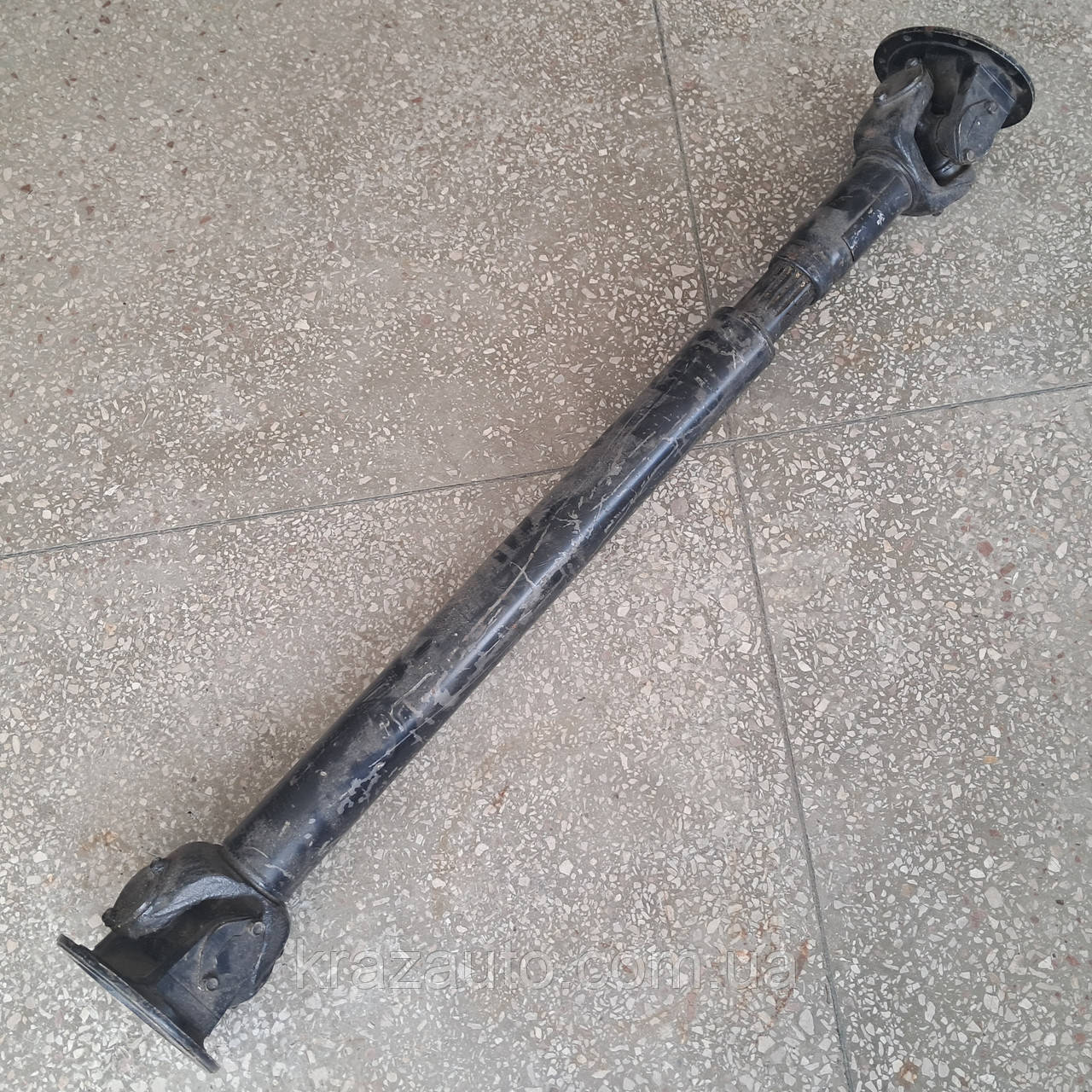 Вал карданний КРАЗ привода проміжного та заднього мостів (L=1403 мм) (8 отворів) 210-2204010-06