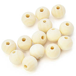 Намистини дерев'яні +-30 шт. 14 мм отвір 3,5 мм Натуральний.