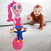 Музыкальная танцующая игрушка Мамочка длинные ноги и малыш Хагги Вагги 35 см