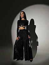 Блискучий трикотажний костюм укорочений топ і брюки кльош з люрексовим напиленням Dvk5498, фото 5