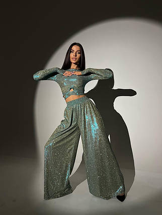 Блискучий трикотажний костюм укорочений топ і брюки кльош з люрексовим напиленням Dvk5498, фото 1