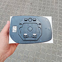 Скло дзеркала (вкладиш, дзеркальний елемент) лівий з підігрівом Toyota Yaris (Тойота Яріс) 2006-2011