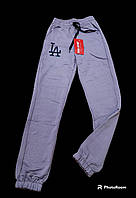 Спортивні дитячі штани для дівчинки низ під гумку трикотаж 7-12 років, колір міксом