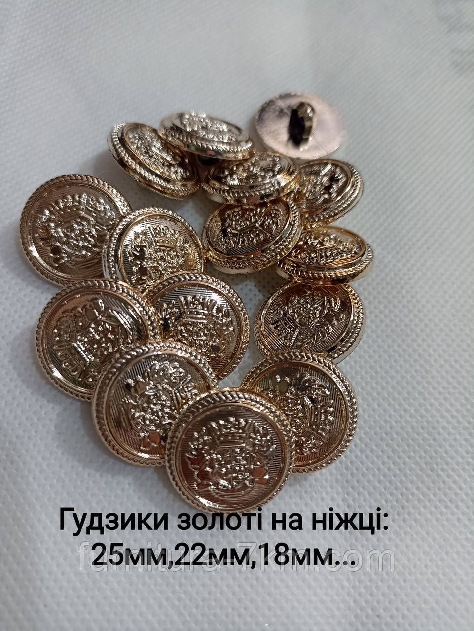 Ґудзики пластикові (золото),
розмір — 25 мм. паковання/200 шт.
На ніжці., фото 1
