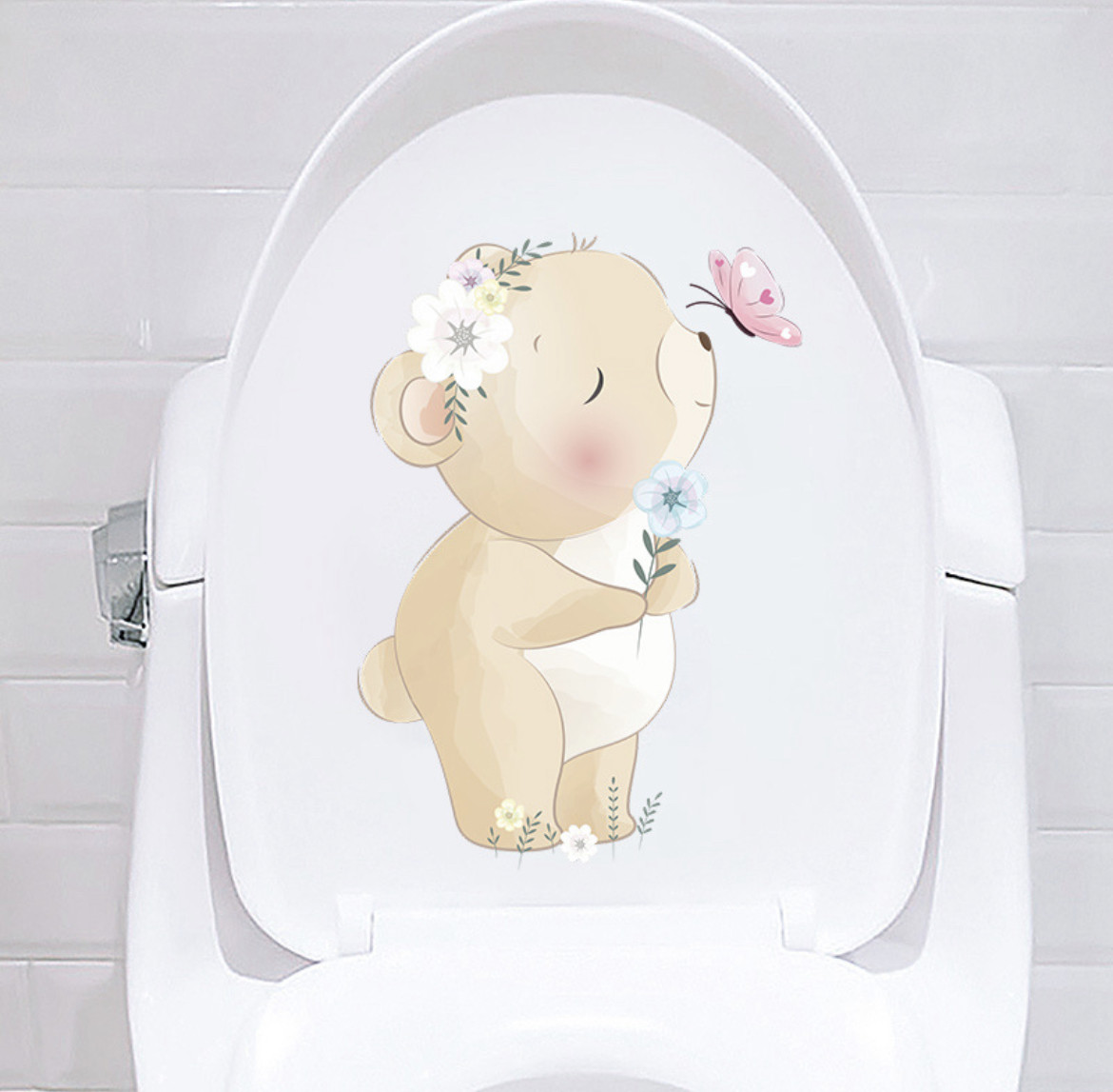 Наліпка декоративна вінілова на стіну на шпалери на меблях дитяча "Ведмедик з квітами" 27*19.5 см