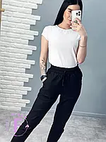 Женские однотонные брюки из льна черного цвета с карманами