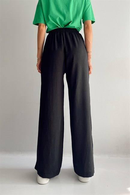 Стильные модные свободные женские штаны брюки Палаццо с разрезами сбоку - фото 8 - id-p1858135968