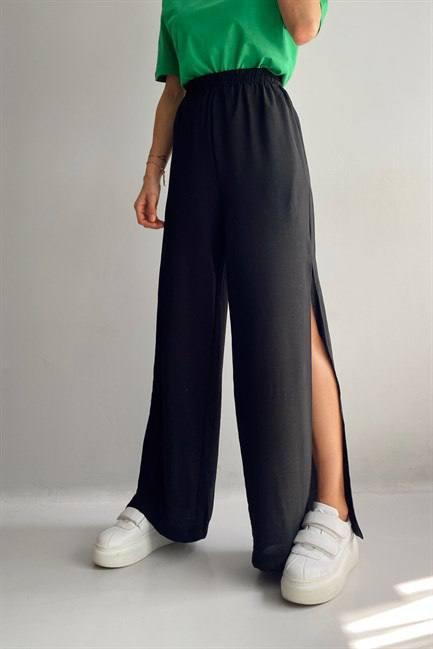 Стильные модные свободные женские штаны брюки Палаццо с разрезами сбоку - фото 10 - id-p1858135968