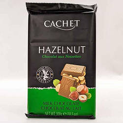 Молочний шоколад з цілим фундуком Cachet milk chocolate Hazelnut 300 г Бельгія