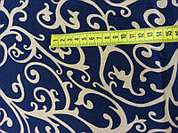 Летняя ткань штапель с рисунком бежевый вензель на синем фоне