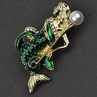 Брошка металева на золотистій основі русалока зі стразами та перлами покрита кольоровою емаллю розмір 40х20 мм