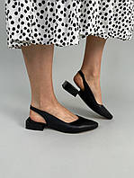 Босоножки женские кожаные черного цвета на низком каблуке