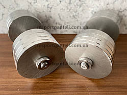 Набірні сталеві гантелі 2x32 кг з металевим грифом та дисками без покриття.